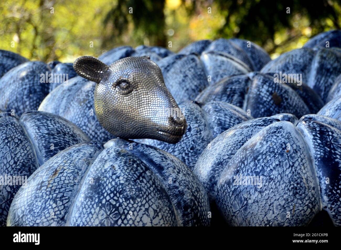 Metal Lambs Head & Cotton Pods on the Cotton Tree Sculpture at The Himalayan Garden & Sculpture Park, Grewelthorpe, Ripon, North Yorkshire, England. Stock Photo