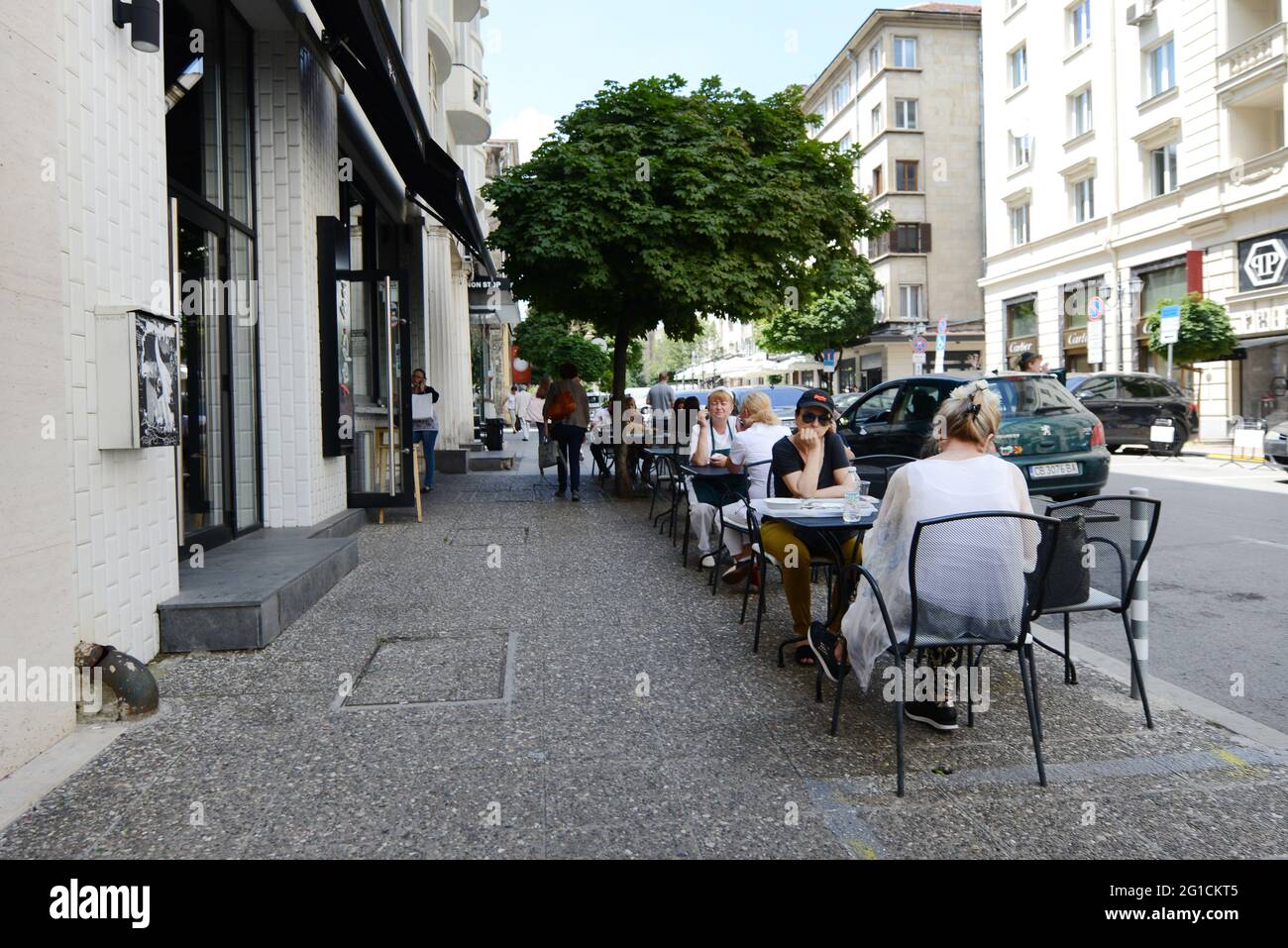 Bulgarians sitting in in a cafe in central Sofia, Bulgaria. Stock Photo