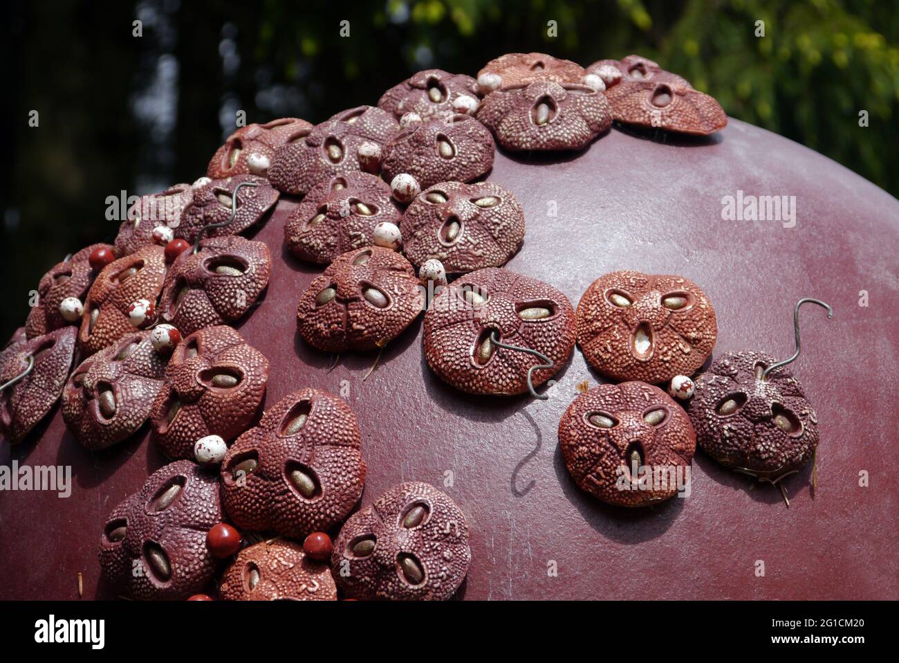 Balls with Giant Clay Pollen Grains 'Rhodi Torana' on Display at the Himalayan Garden & Sculpture Park, Grewelthorpe, Ripon, North Yorkshire Stock Photo