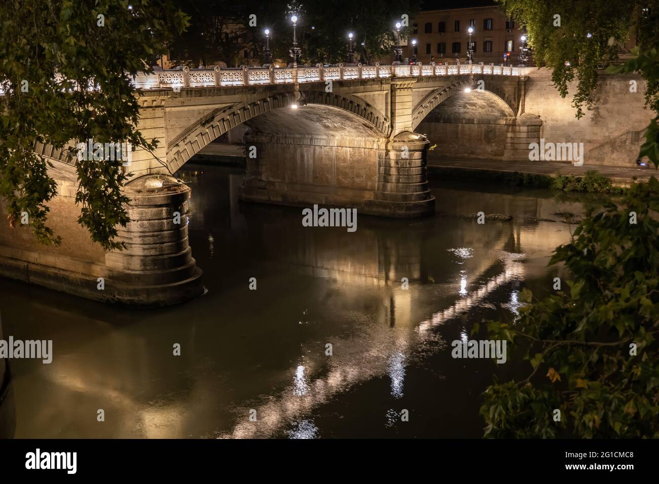 Ponte Giuseppe Mazzini bridge on Tiber River at night in Rome, Italy. Stock Photo