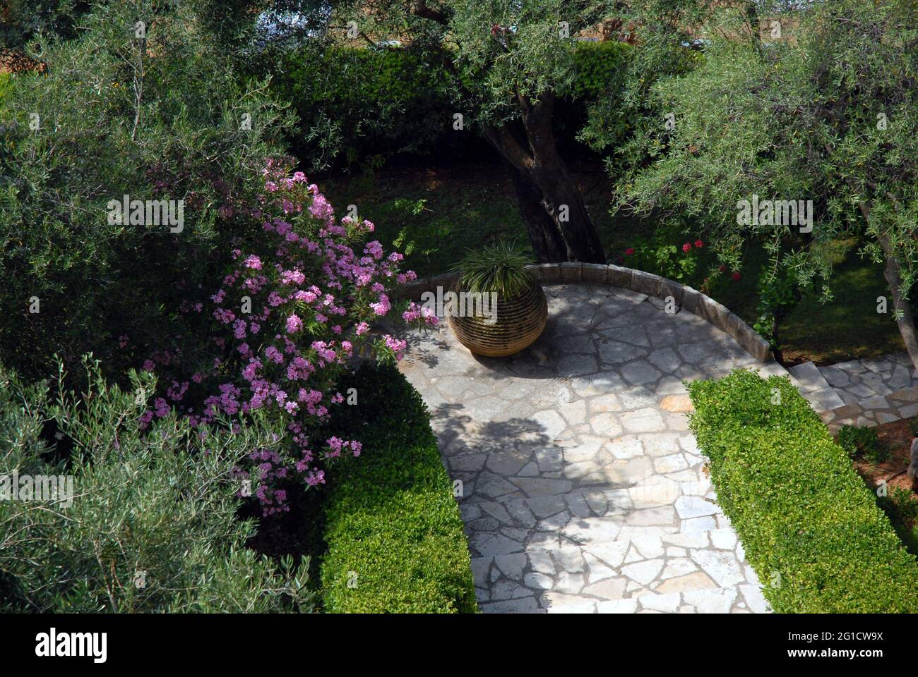 Quiet corner in hotel garden, Corfu, Greece Stock Photo