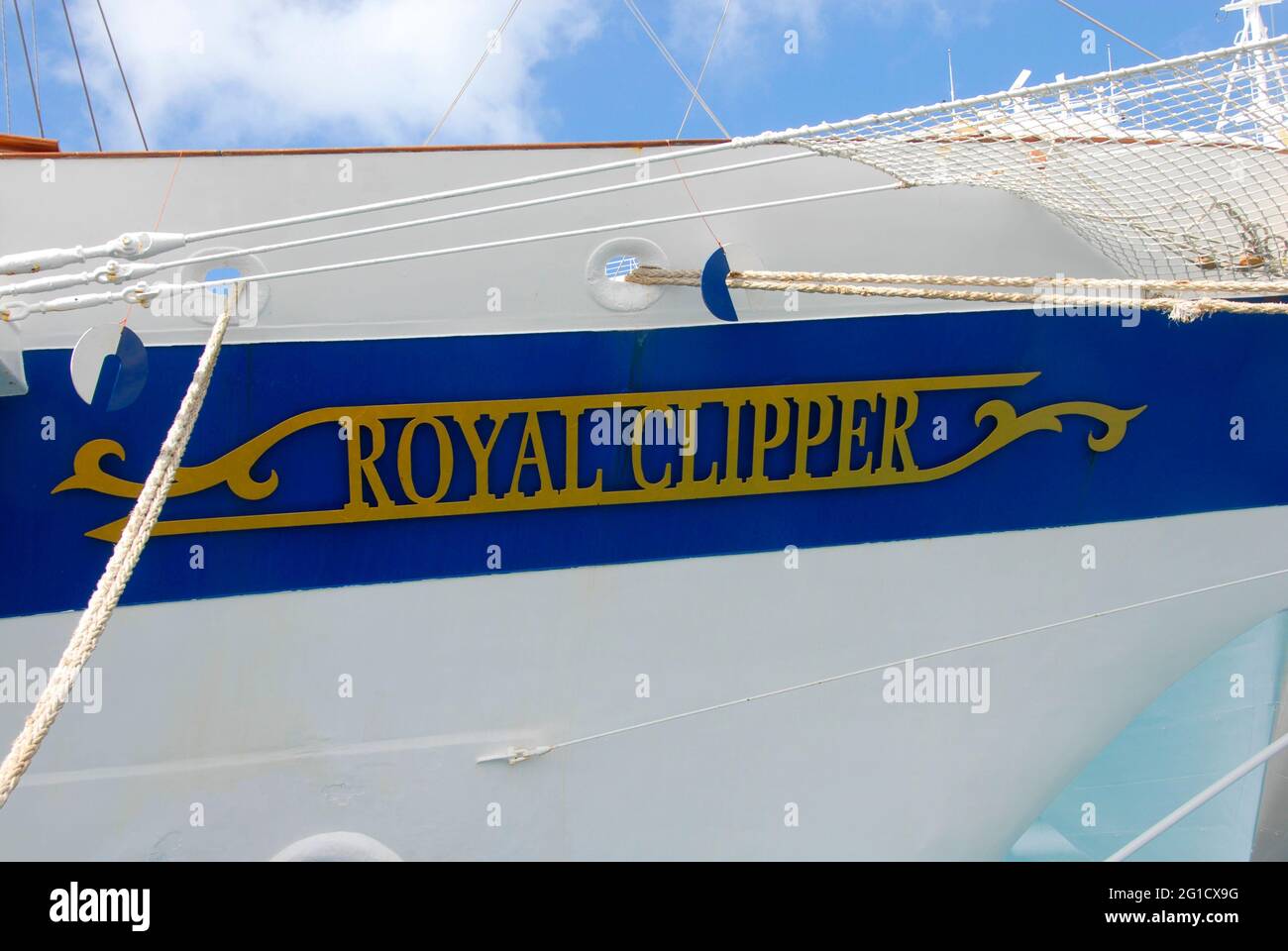 The name 'Royal Clipper' on the bow of the five-masted tall ship while berthed in Barbados, Caribbean sailing as a luxury cruise liner Stock Photo
