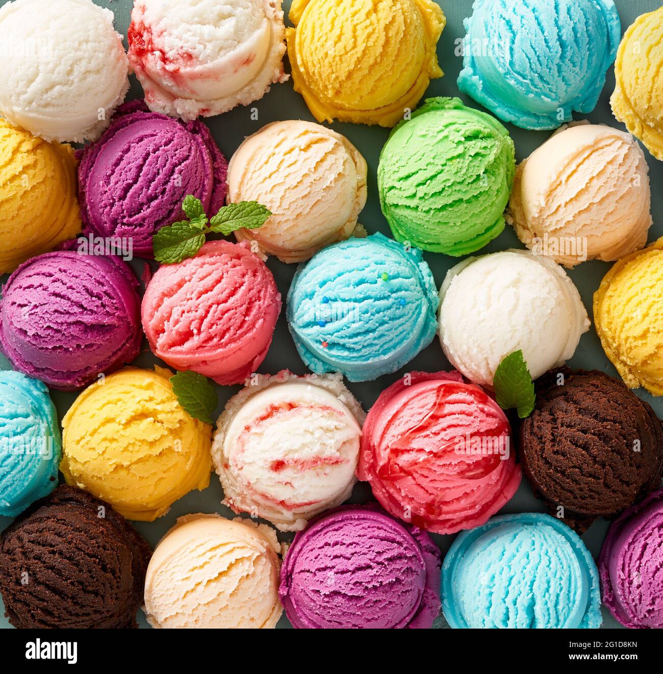 Assorted of scoops ice cream. Colorful set of ice cream of different flavours. Top view of ice cream isolated with mint, sauce Stock Photo