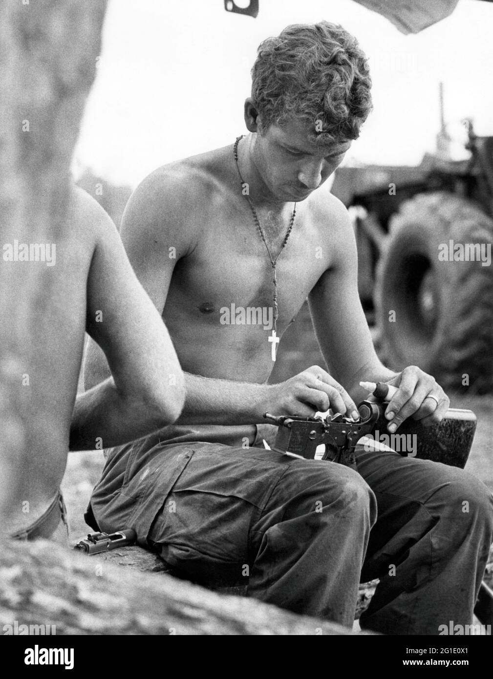 geography/travel, Asia, Vietnam, Viet Nam, War, US soldier, cleaning his M-16 assault rifle, ADDITIONAL-RIGHTS-CLEARANCE-INFO-NOT-AVAILABLE Stock Photo