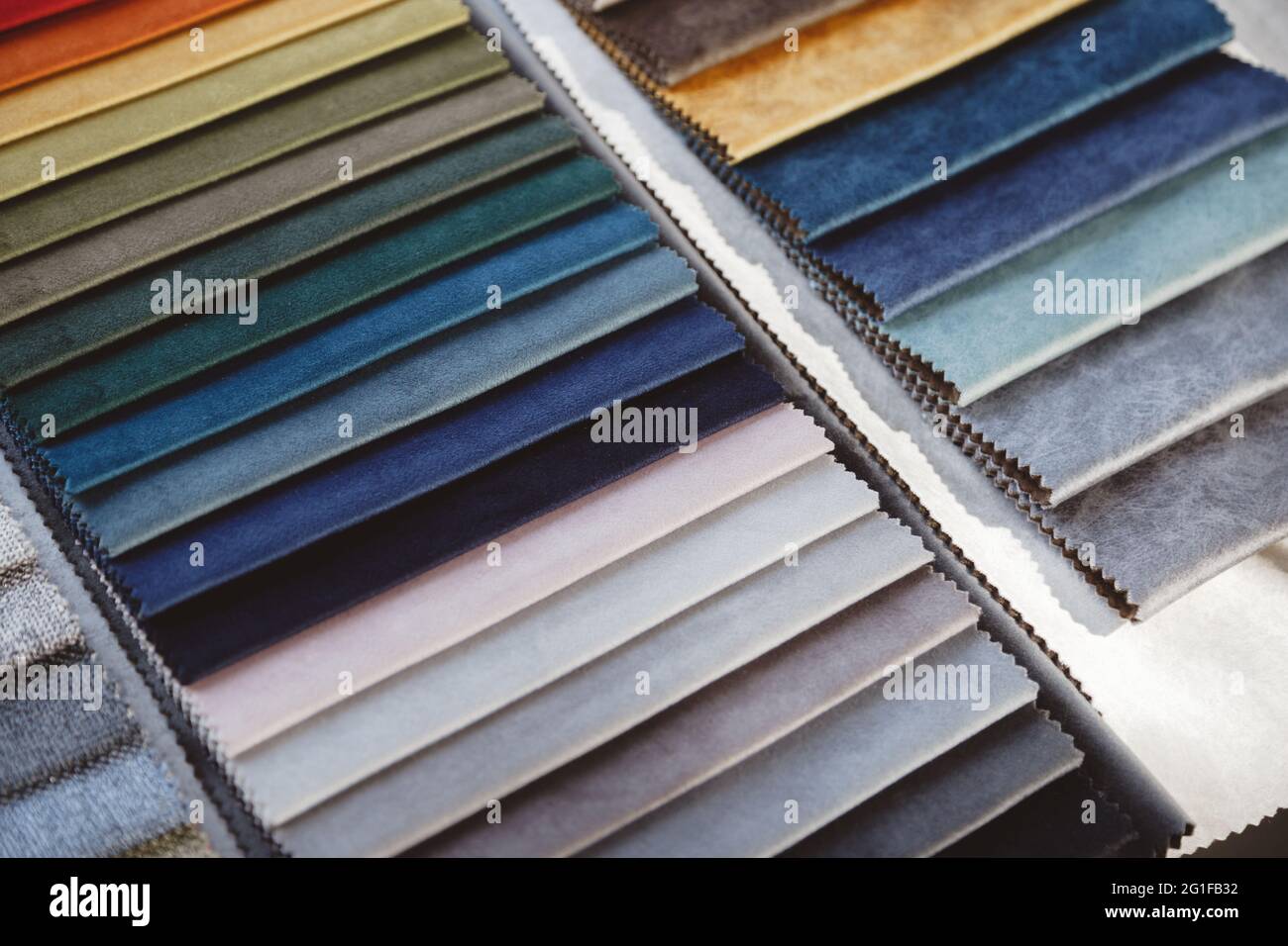 Colorful upholstery samples in the shop Stock Photo - Alamy
