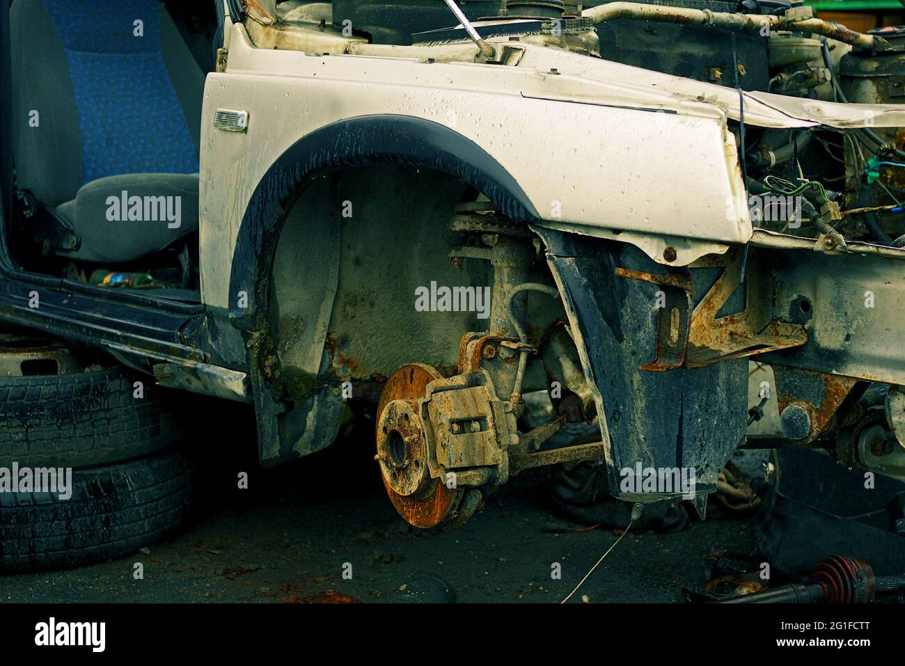 body of old car dismantled for spare parts, color graded Stock Photo