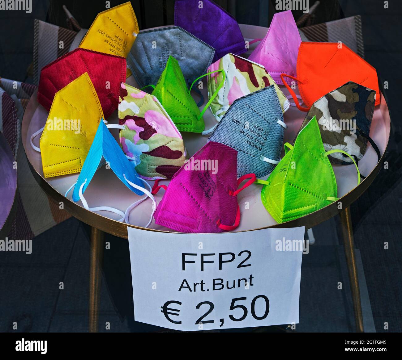 FFP2 masks colored, EUR 2, 50, Munich, Upper Bavaria, Bavaria, Germany Stock Photo