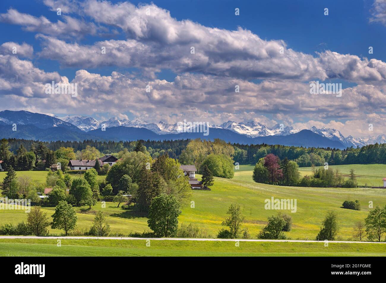 Springlike landscape in the foothills of the Alps with (cumulus) clouds, near Deining, Upper Bavaria, Bavaria, Germany Stock Photo