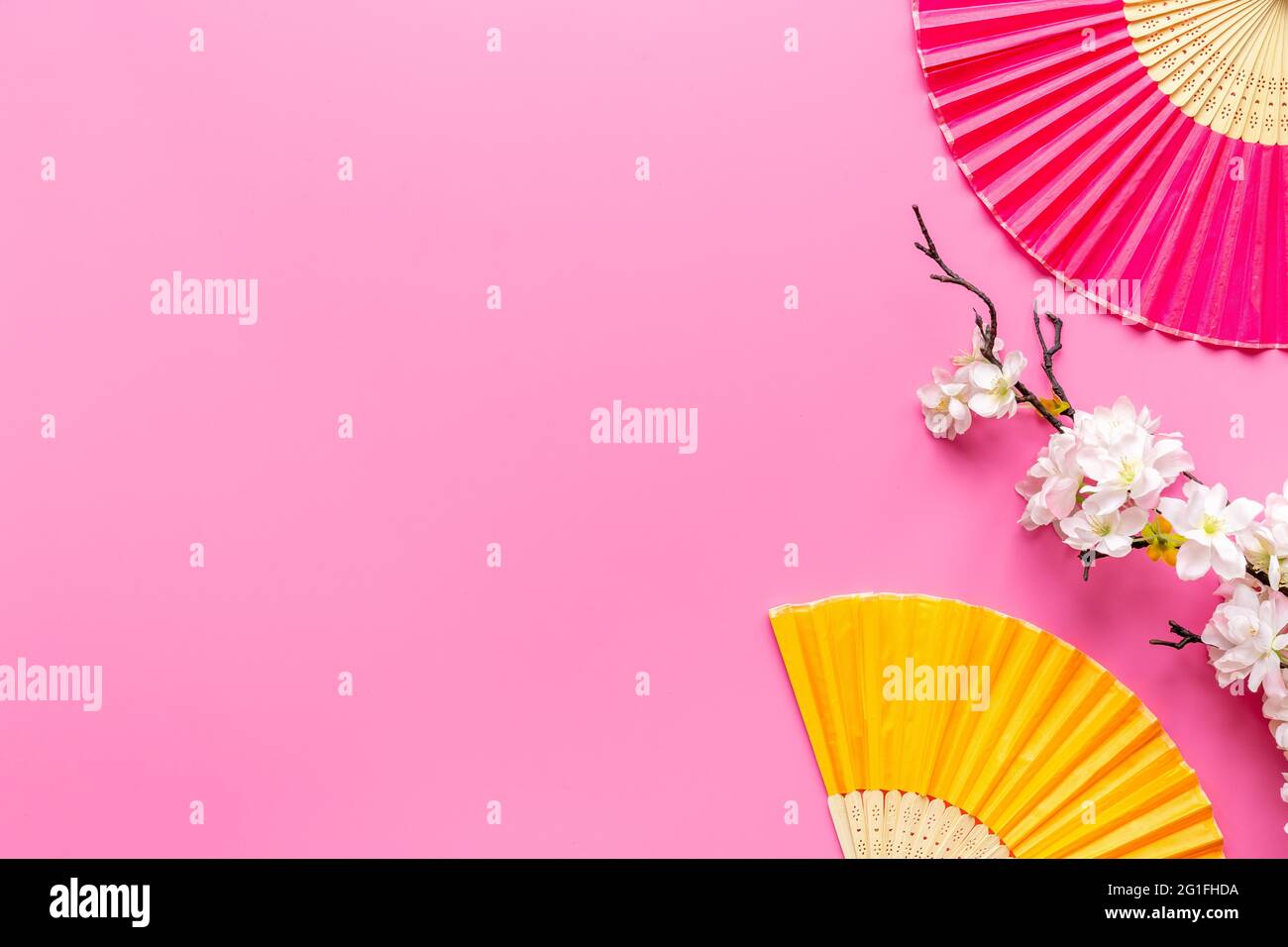 Asian background with hand fans and blossom branches Stock Photo - Alamy