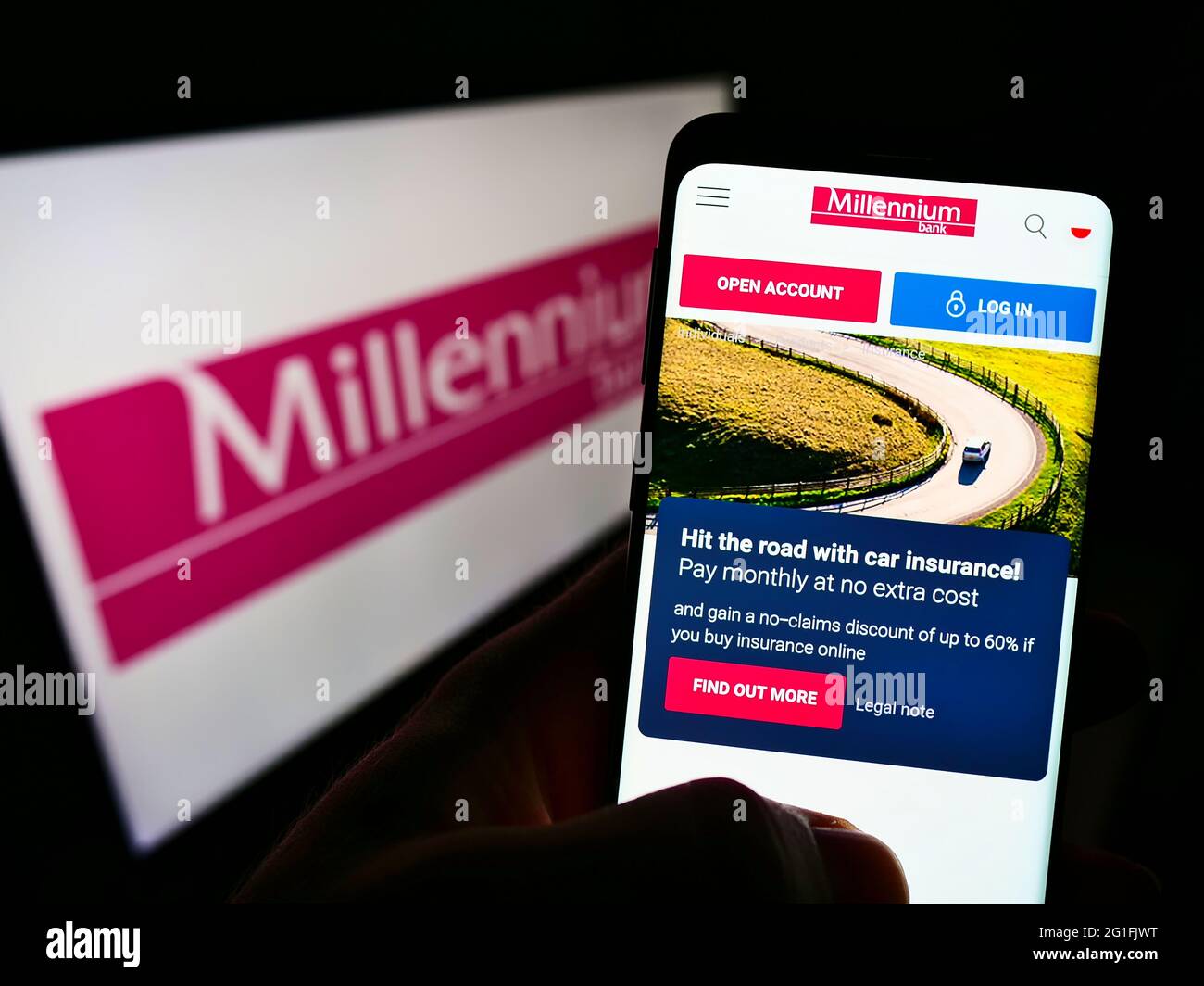 Person holding cellphone with webpage of Polish financial company Bank  Millennium S.A. on screen in front of logo. Focus on center of phone  display Stock Photo - Alamy