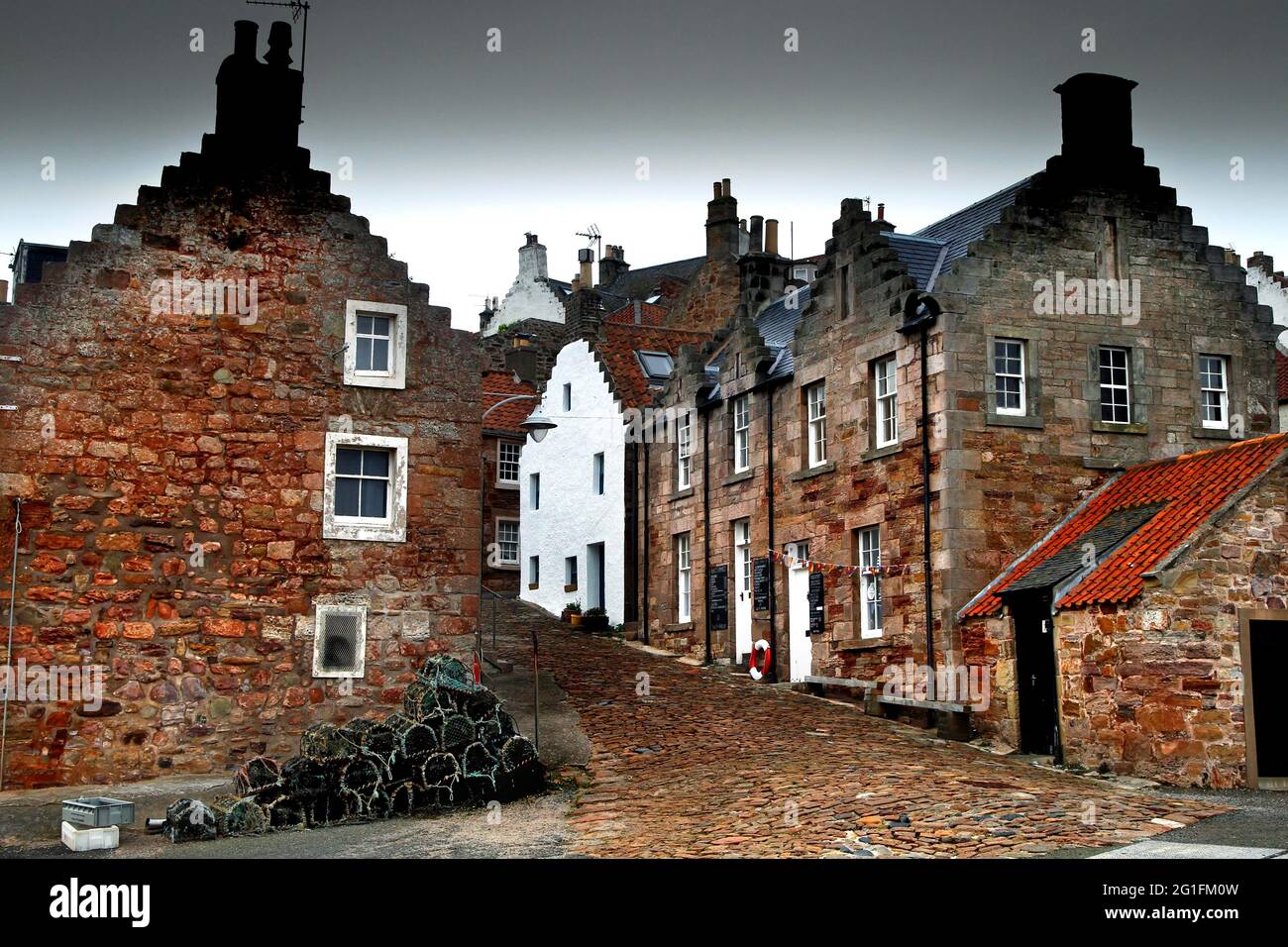 Village street, road, houses, brick buildings, small town, Crail, Fife, Firth of Forth, Midlands, Central Scotland, Scotland, United Kingdom Stock Photo