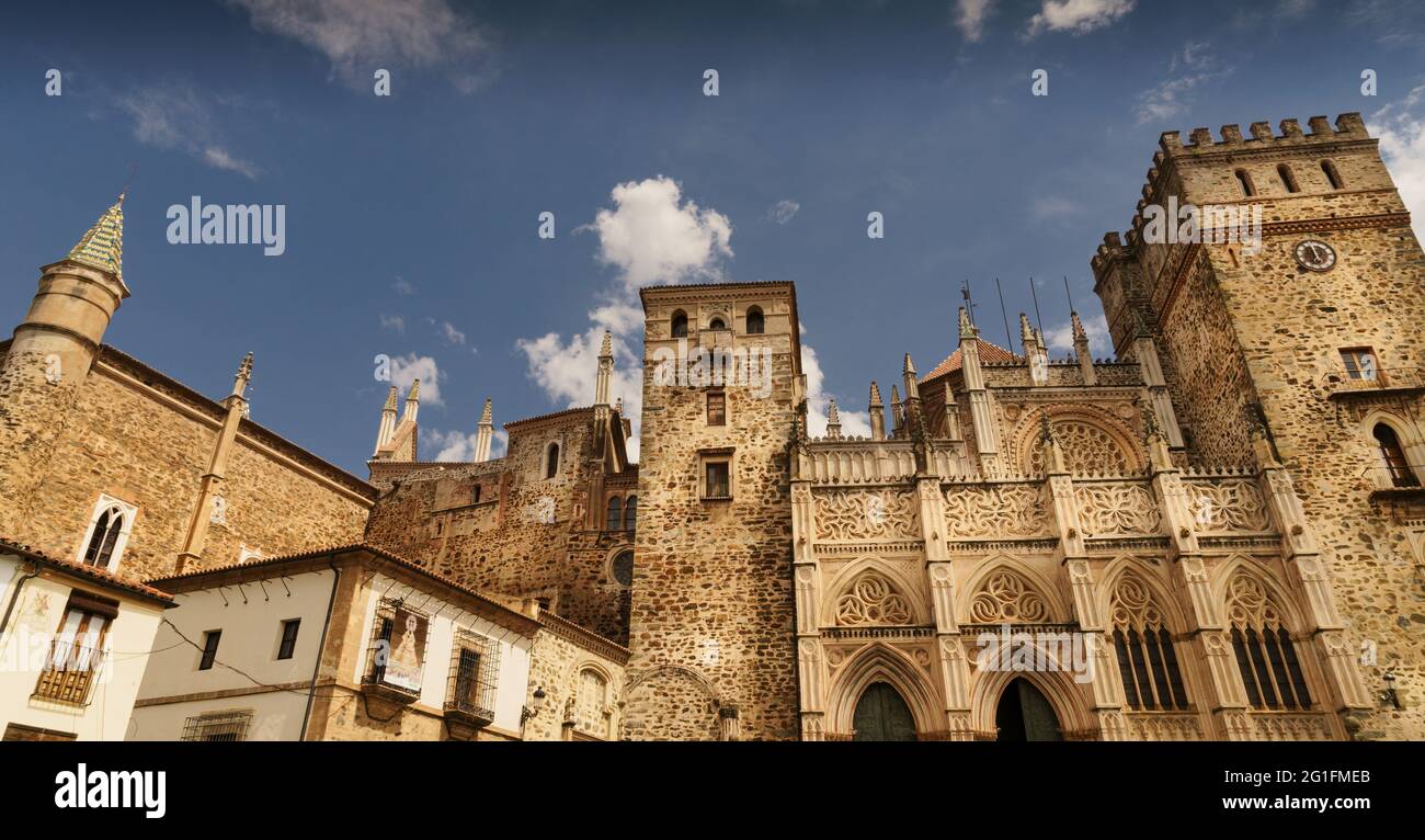 Main facade of the Mudejar Gothic Monastery of Guadalupe in Spain. World heritage Stock Photo