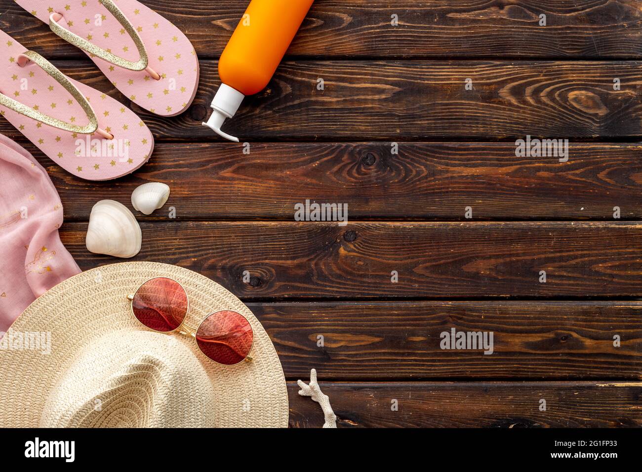 Straw beach womans hat with sun glasses on sand. Top view Stock Photo ...