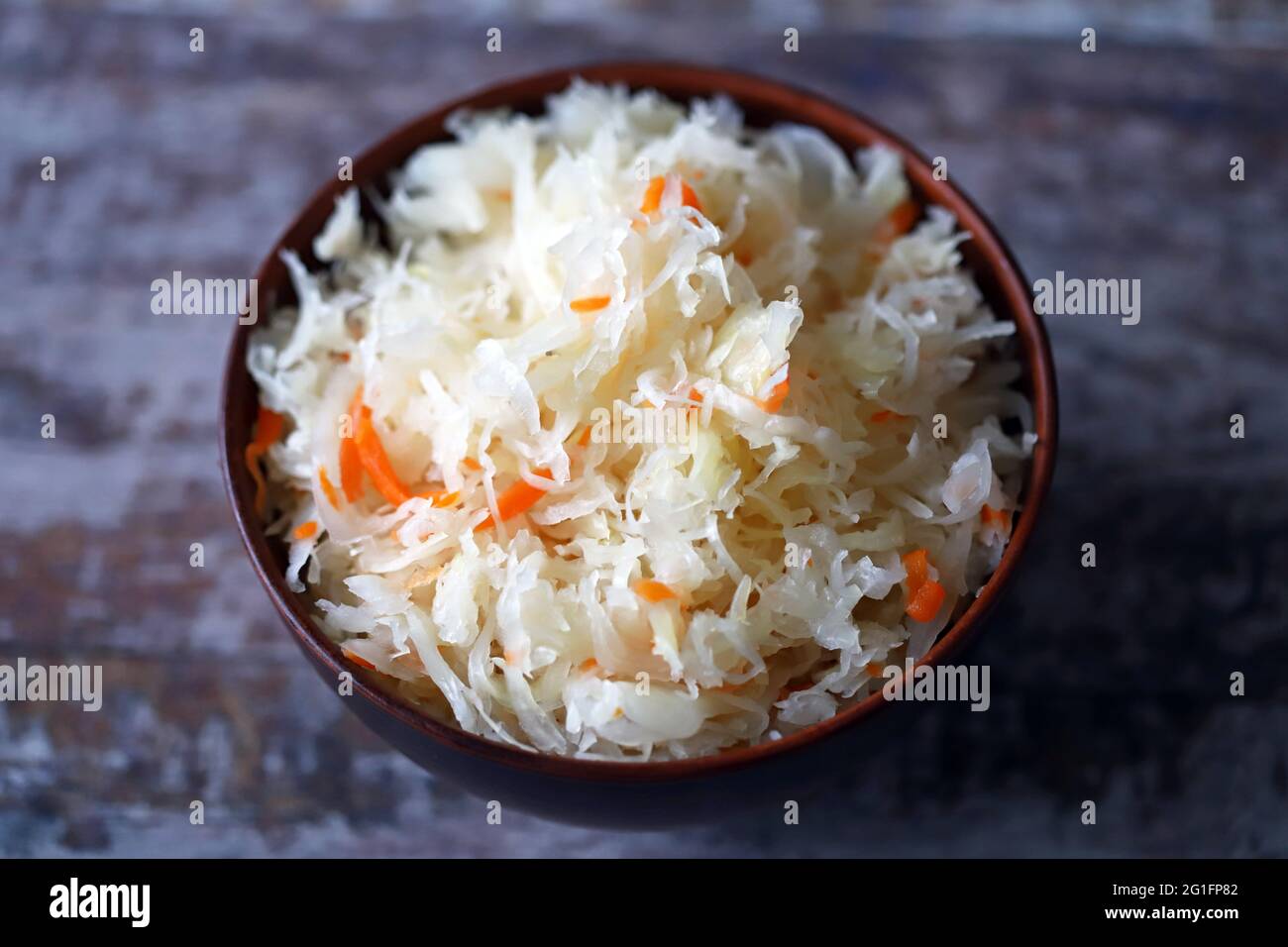 Sauerkraut in a bowl. Probiotics and fermented foods. Stock Photo