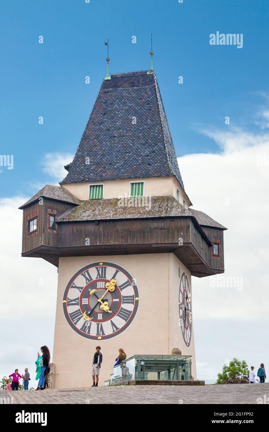 Graz, Austria - May 28 2019: The Clock Tower (German: Uhrturm) is a recognisable icon for the city, and is unusual in that the clock's hands have oppo Stock Photo
