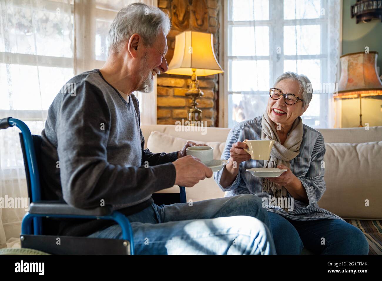 Happy wheelchair people old hi-res stock photography and images - Alamy