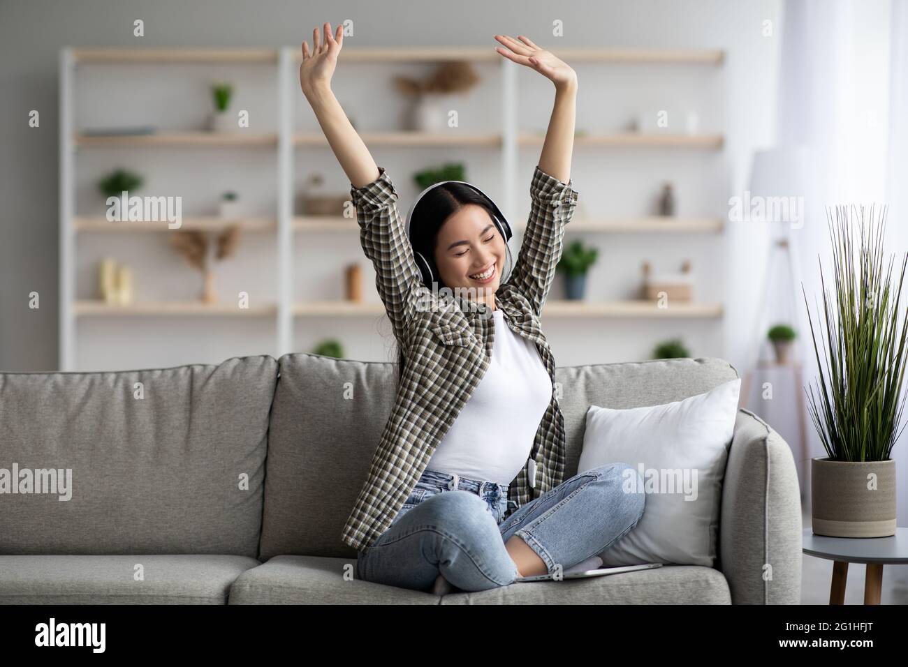 Young asian woman dancing in hi-res stock photography and images - Alamy