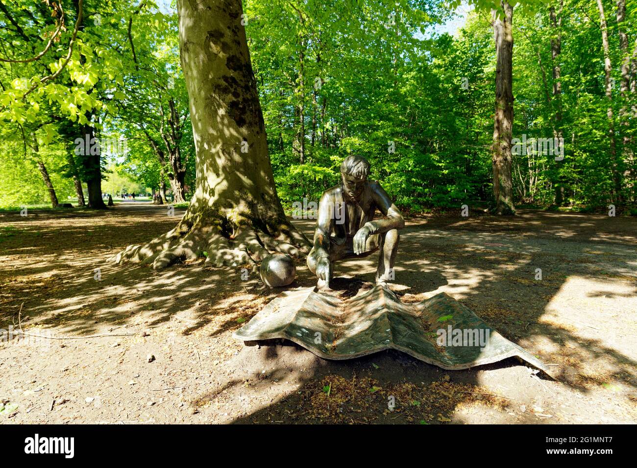 France, Bas Rhin, Strasbourg, La Roberstau district, Pourtales Castle park, the Sculpture Park, Genius Loci (The Spirit of Places) by Giulio Paolini (2001), The figure crouching beside a sphere is scrutinizing a map lying on the ground Stock Photo