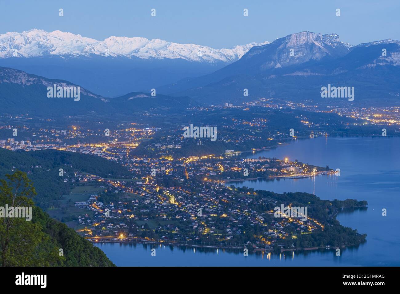 France, Savoie, Aix-les-Bains on the banks of the Bourget Lake, Mont Granier (alt : 1933m) in the Chartreuse massif and the snowy Belledonne massif in the background Stock Photo