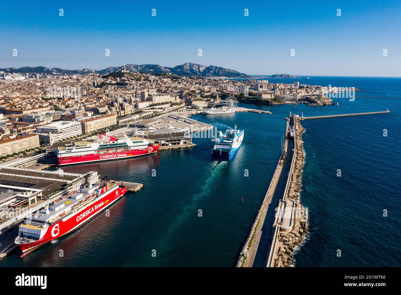 Marseille (south eastern France): aerial view of the Marseille Fos Port and  the city. Corsica Linea ferries alongside the quay. Dyke on the right Stock  Photo - Alamy