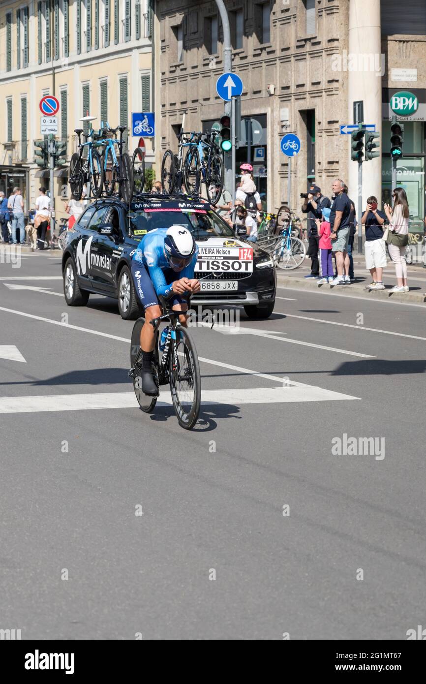 MILAN, ITALY - MAY 30: last stage of Giro 2021, Nelson Oliviera competitor and Moviestar Team  following car at high speed during individual time tria Stock Photo