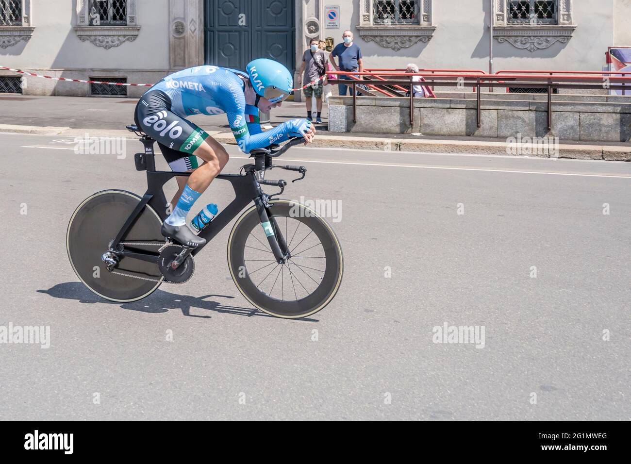 MILAN, ITALY - MAY 30: last stage of Giro 2021, Marton Dina competitor of Eolo-Kometa Team  at high speed during individual time trial in city streets Stock Photo