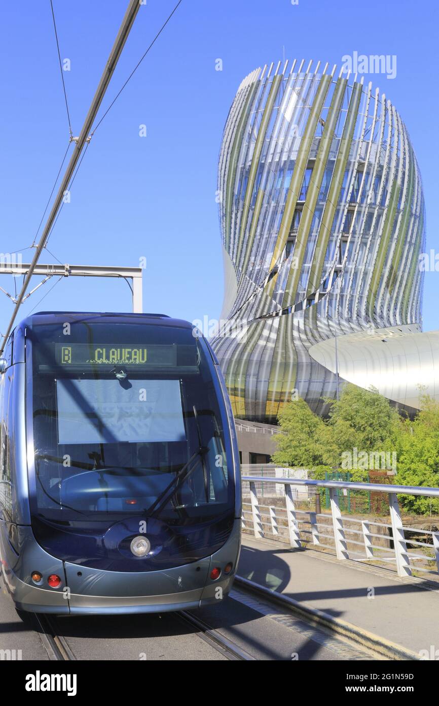France, Gironde, Bordeaux, Bassins � flot district, Cit� du Vin designed by the architects XTU and opened in 2016 with the tramway in the foreground Stock Photo