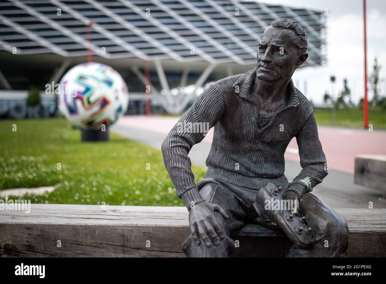 Herzogenaurach, Germany. 07th June, 2021. A statue of founder Adolf "Adi"  Dassler has been erected in front of the "Arena" office building on the  grounds of sporting goods manufacturer adidas. In the