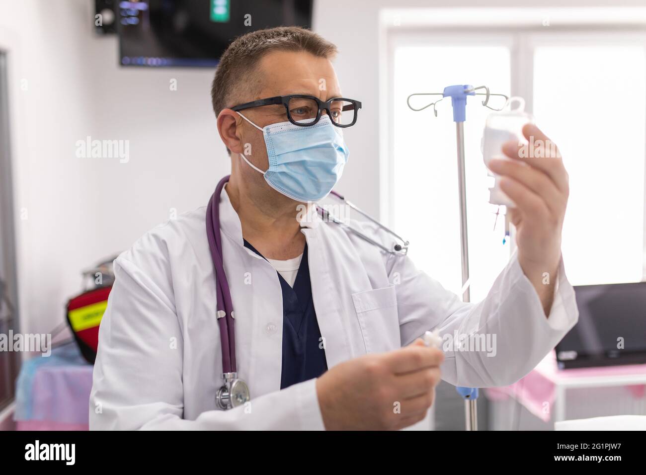 Doctor take care or look after patient by himself. Doctor checking