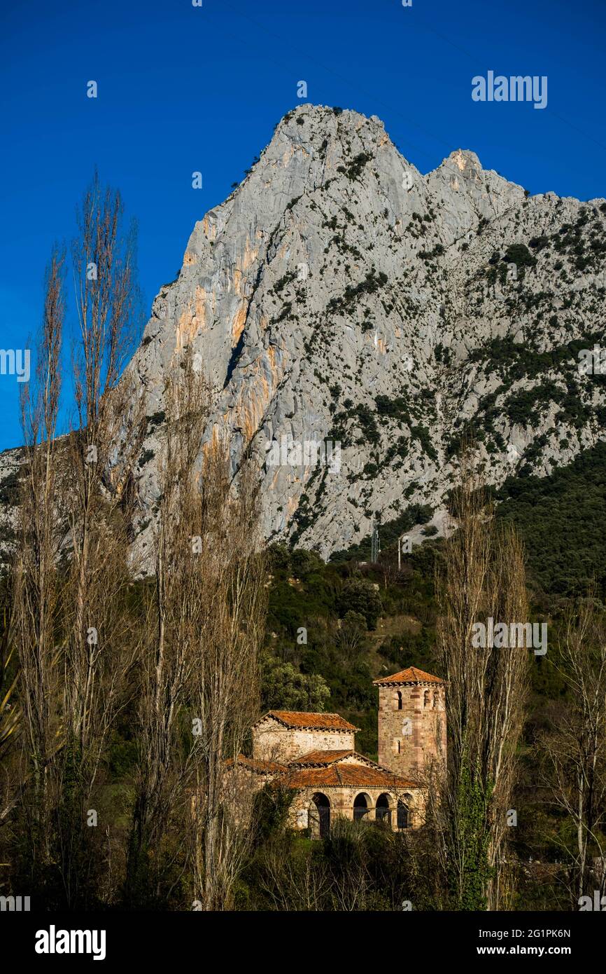 Spain, Cantabria, Picos de Europa, Potes, Church of St. Mary of Lebe�a, from the 10th century, in Mozarabic style, Spanish historical monument, in front of the cliffs of the Hermida canyon Stock Photo