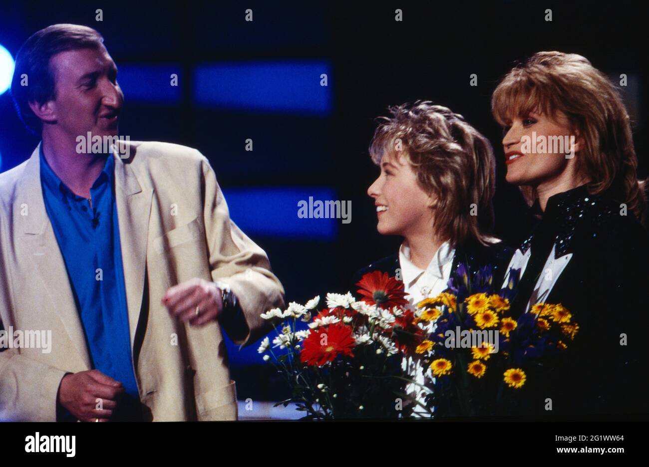 Vier gegen Willi, Speilshow, Deutschland 1986 - 1989, Sendung vom 17. April 1988, Moderator Mike Krüger mit Maxi und Chris Garden Stock Photo