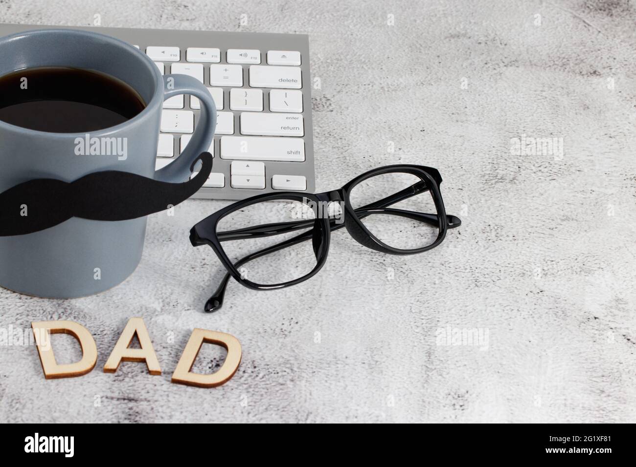 Father's Day celebration theme with DAD letters and a cup of coffee ...