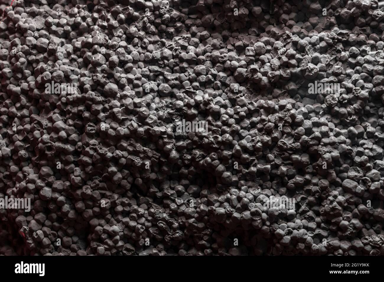 blurr texture is an abstraction. A wall of black balls, like styrofoam. Stock Photo