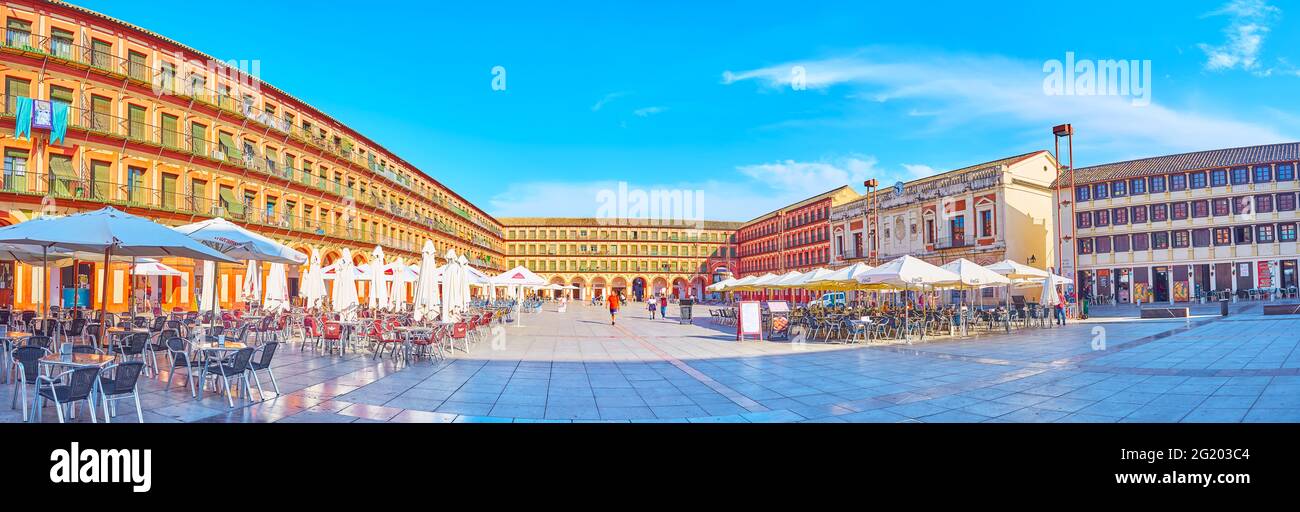 CORDOBA, SPAIN - SEP 30, 3019: Panorama of Corredera Square with cafes, scenic edifices, Chief Magistrate's House and Dona Jacinta House (from the rig Stock Photo