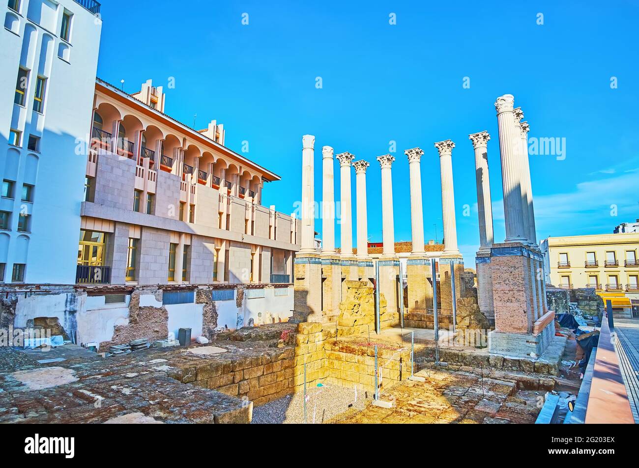 The archaeological site in old town with ruins of the antique Roman Temple, Calle Capitulares, Cordoba, Spain Stock Photo