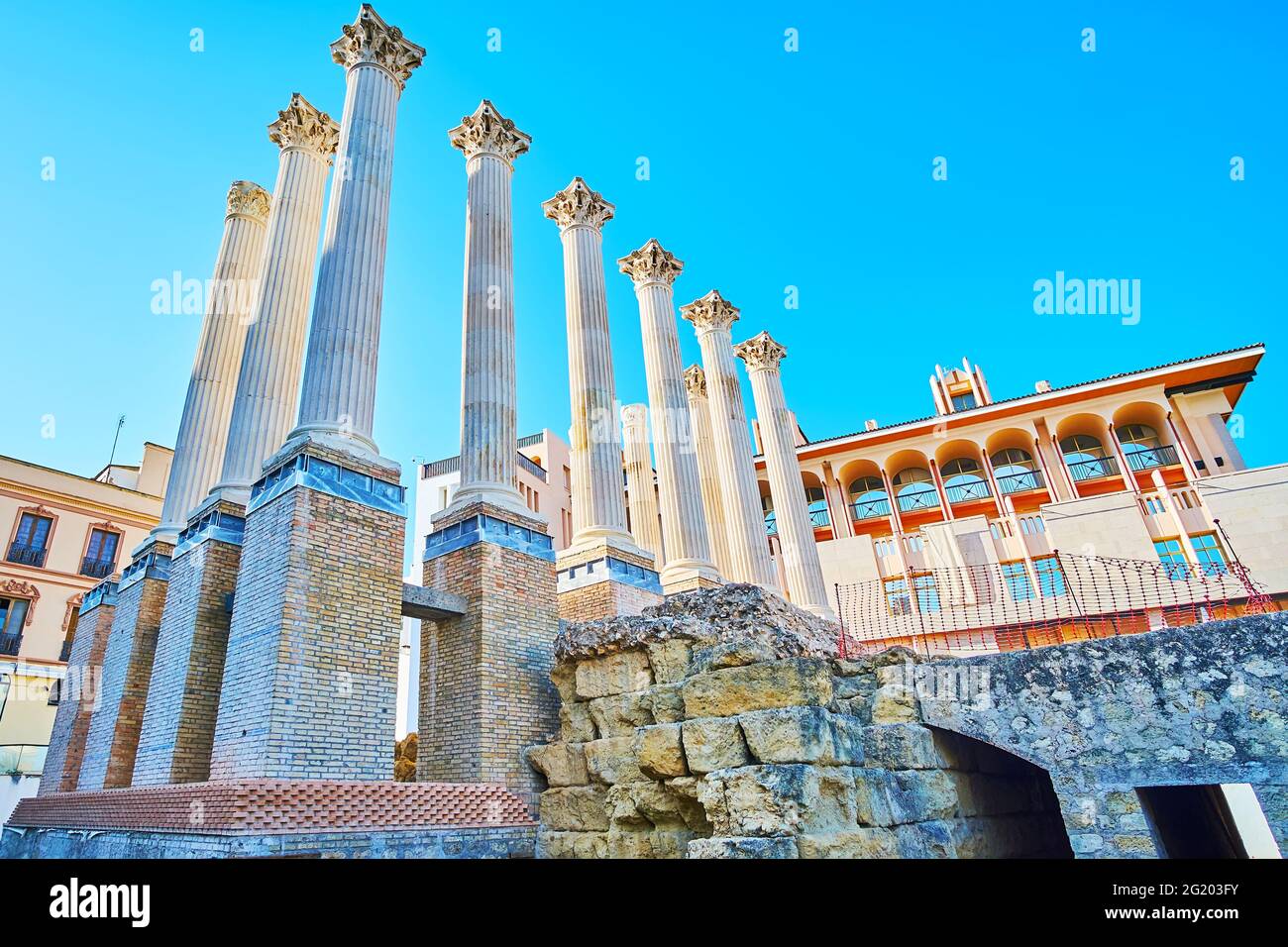 Explore the ruins of the antique Roman Temple, located in Calle Capitulares street in the old town of Cordoba, Spain Stock Photo