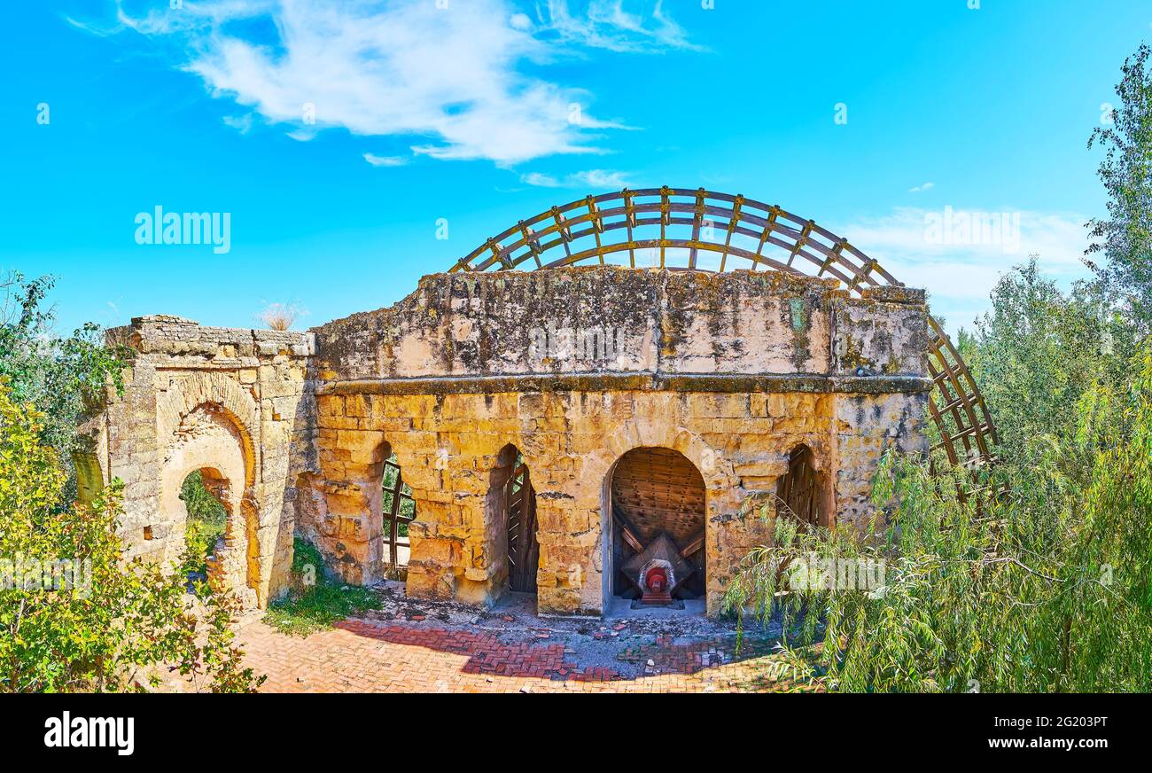 The medieval limestone ruins of Molino de la Albolafia noria (waterwheel, water mill), located on the bank of Guadalquivir River in Cordoba, Spain Stock Photo