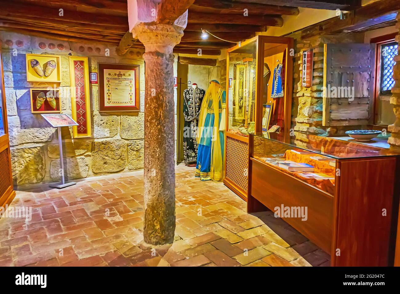 CORDOBA, SPAIN - SEPTEMBER 30, 2019: The ethnographic exhibition in Casa de Sefarad with historic attire and accessories, Juderia (Jewish Quarter), on Stock Photo