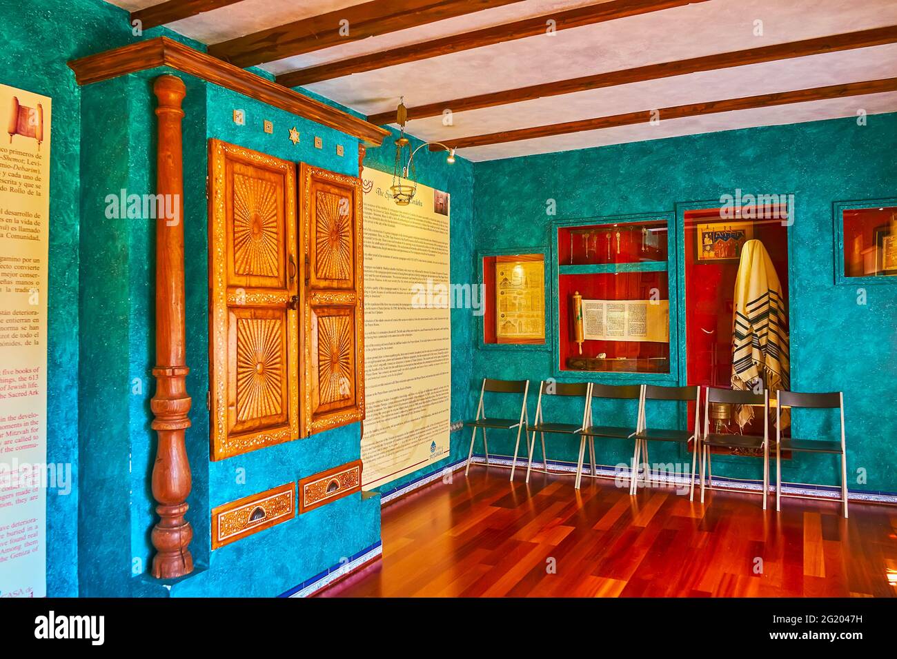CORDOBA, SPAIN - SEPTEMBER 30, 2019: The hall of Casa de Sefarad or the House of Memories with ornate Torah Ark and some historic ritual Judaical item Stock Photo