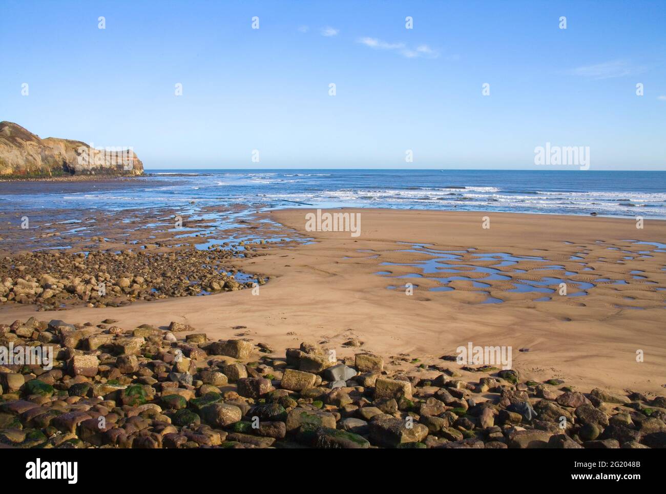 the fine sandy beach at sandsend on the yorkshire coast Stock Photo