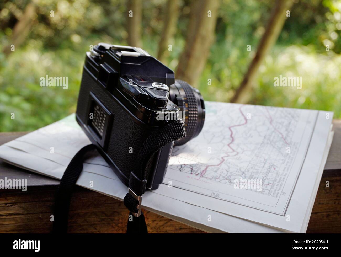 film camera and folded  map Stock Photo