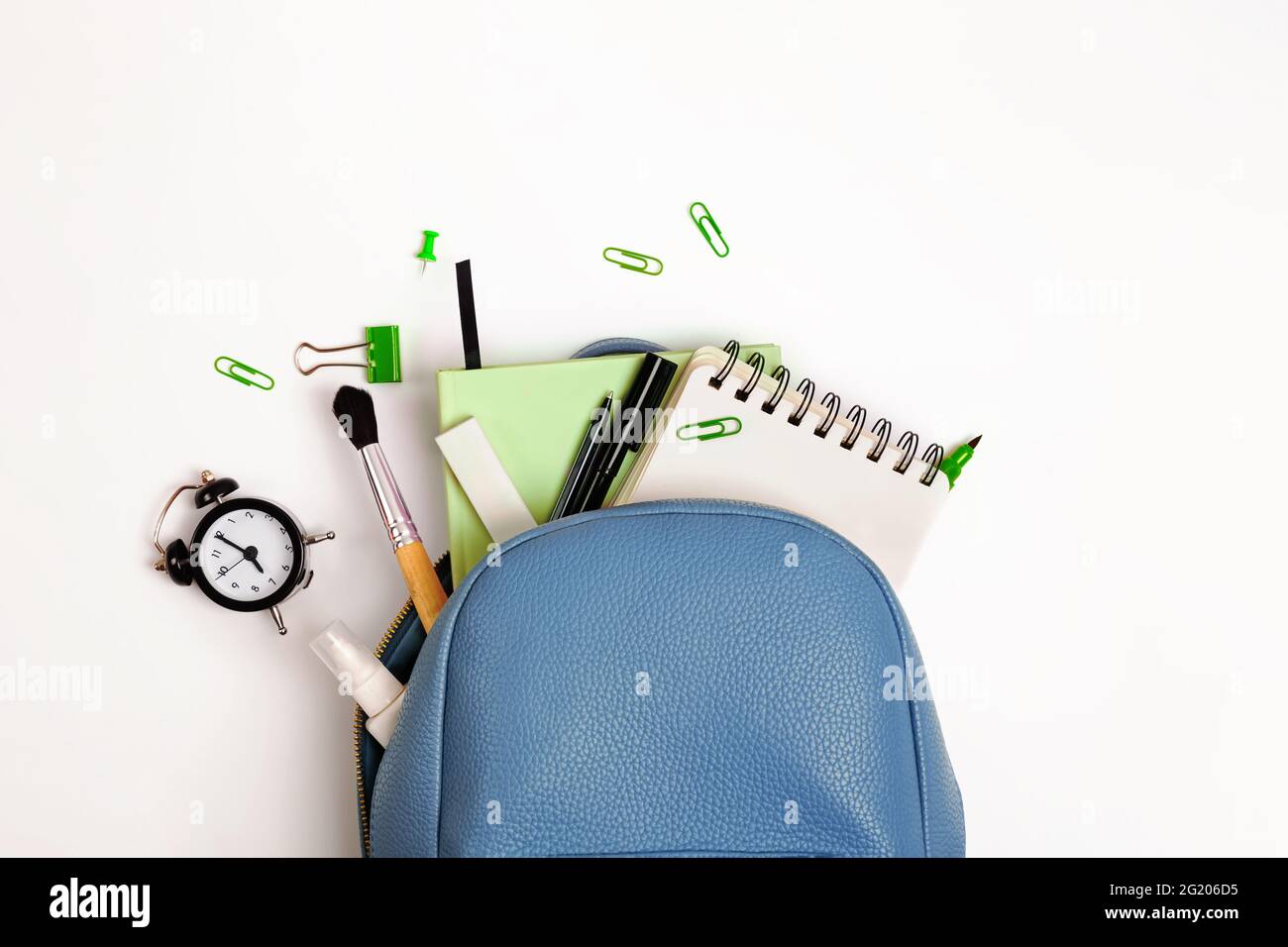 Student's backpack with different stationery and study supplies Stock Photo