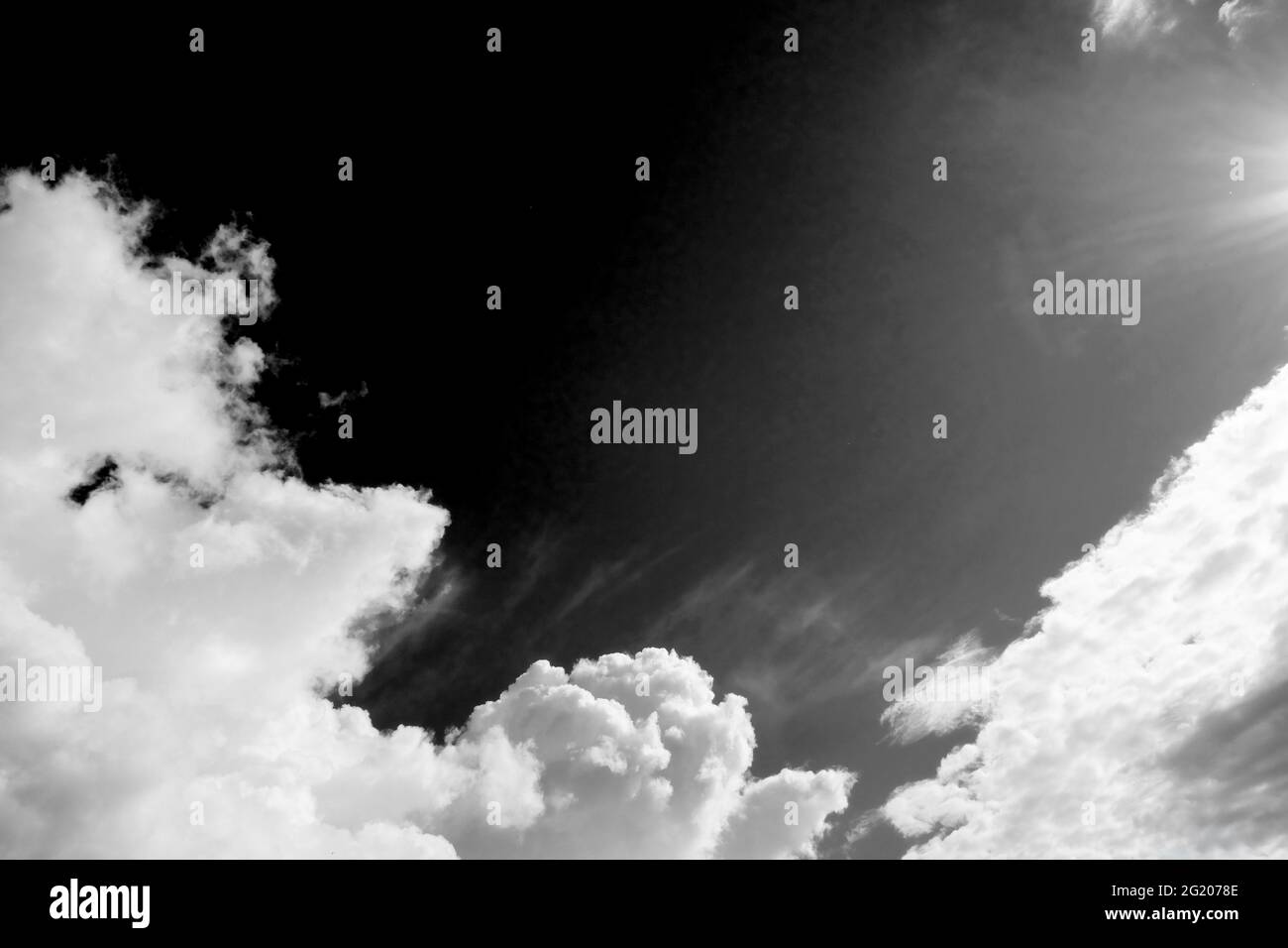 Fluffy white clouds - John Gollop Stock Photo