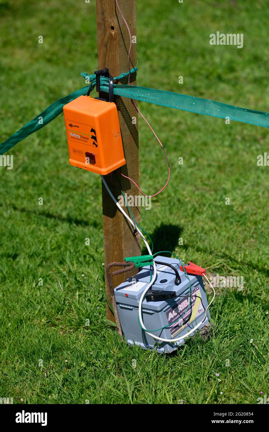 Electric fence and battery Stock Photo Alamy