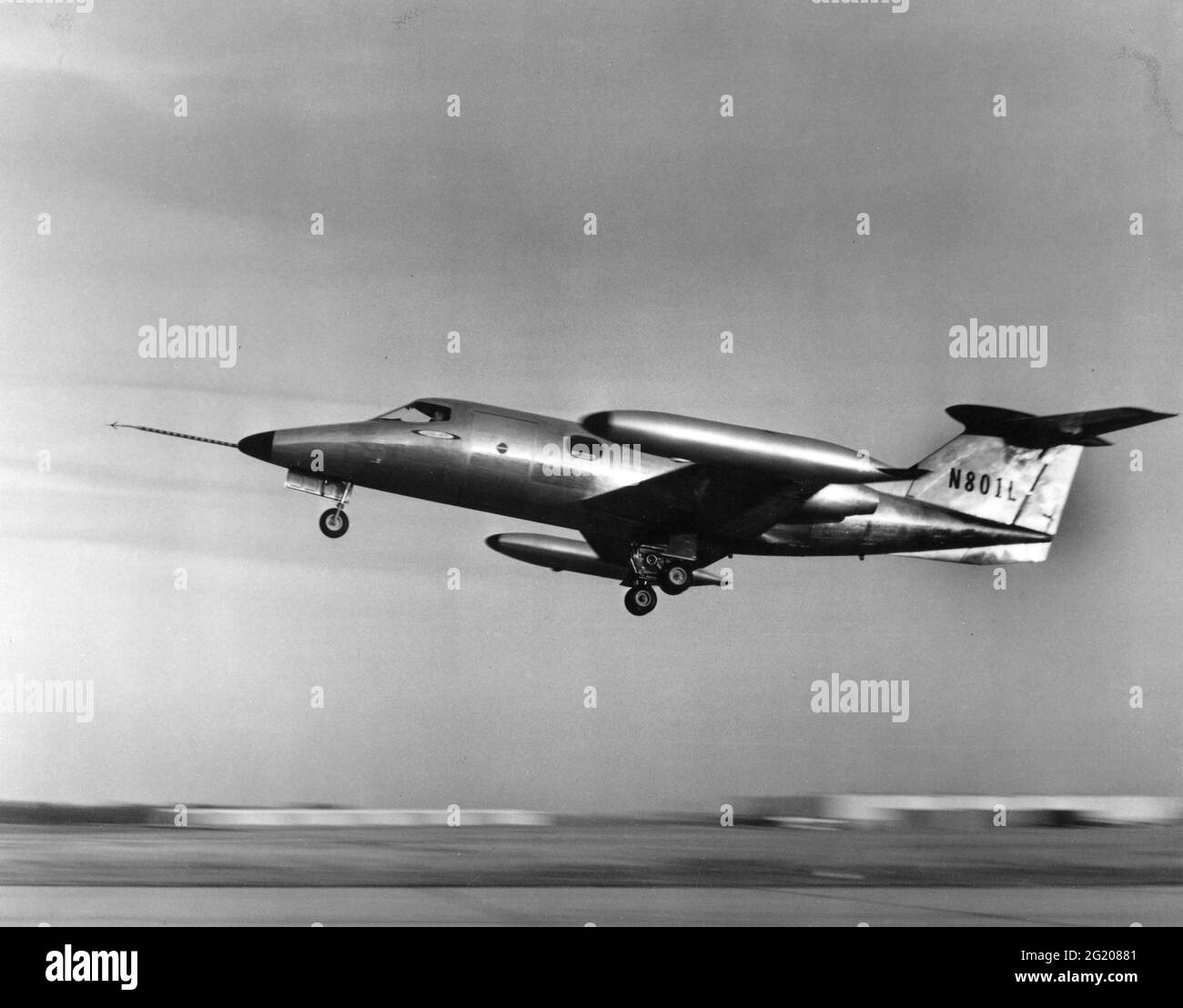 One of the first private, luxury aircraft, the Learjet 23, serial number 23-001 (N801L) takes off on its first flight, Wichita, KS, 10/7/1963. (Photo by Federal Aviation Administration/RBM Vintage Images) Stock Photo