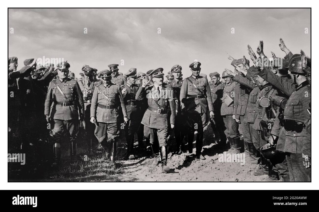 POLAND INVASION OCCUPATION Adolf Hitler visits troops in Poland, 1939. Adolf Hitler  visits German troops in Poland, which greet him with the Hitler salute. From left: Colonel General Wilhelm Keitel, Colonel General Walther von Brauchitsch, Colonel General Fedor von Bock, Hitler and left behind him is SS-group leader Reinhard Heydrich..1939 Stock Photo
