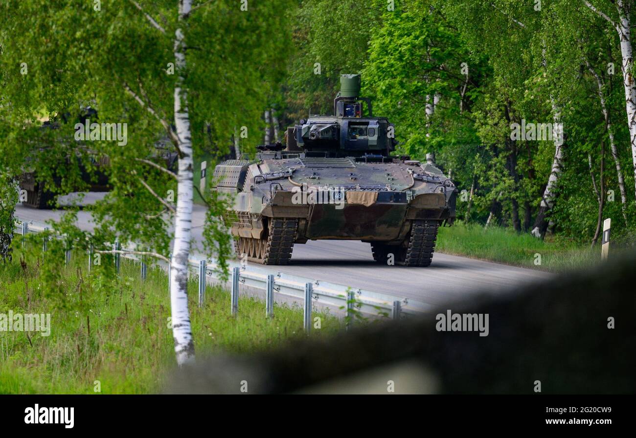 Munster, Germany. 02nd June, 2021. A Bundeswehr Puma infantry fighting vehicle drives along a road during a combat demonstration. Credit: Philipp Schulze/dpa/Alamy Live News Stock Photo