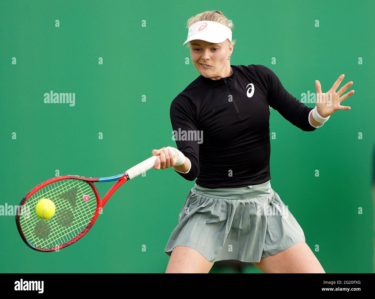 Harriet Dart in action during her WTA first round match against Emma