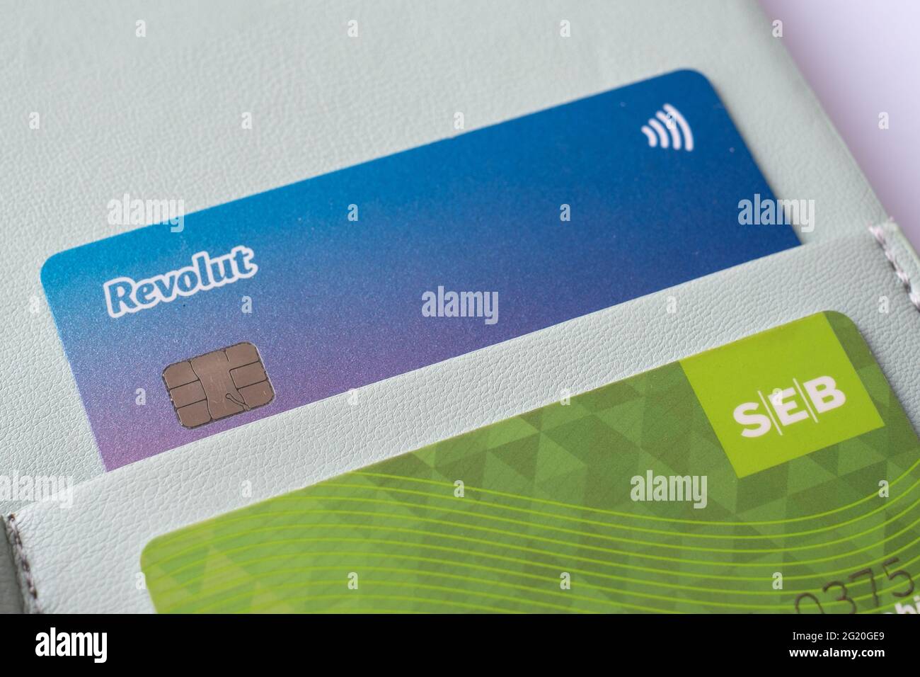 SEB - Swedish bank founded and controlled by the Swedish Wallenberg family. Revolut - UK based financial technology company. Stock Photo