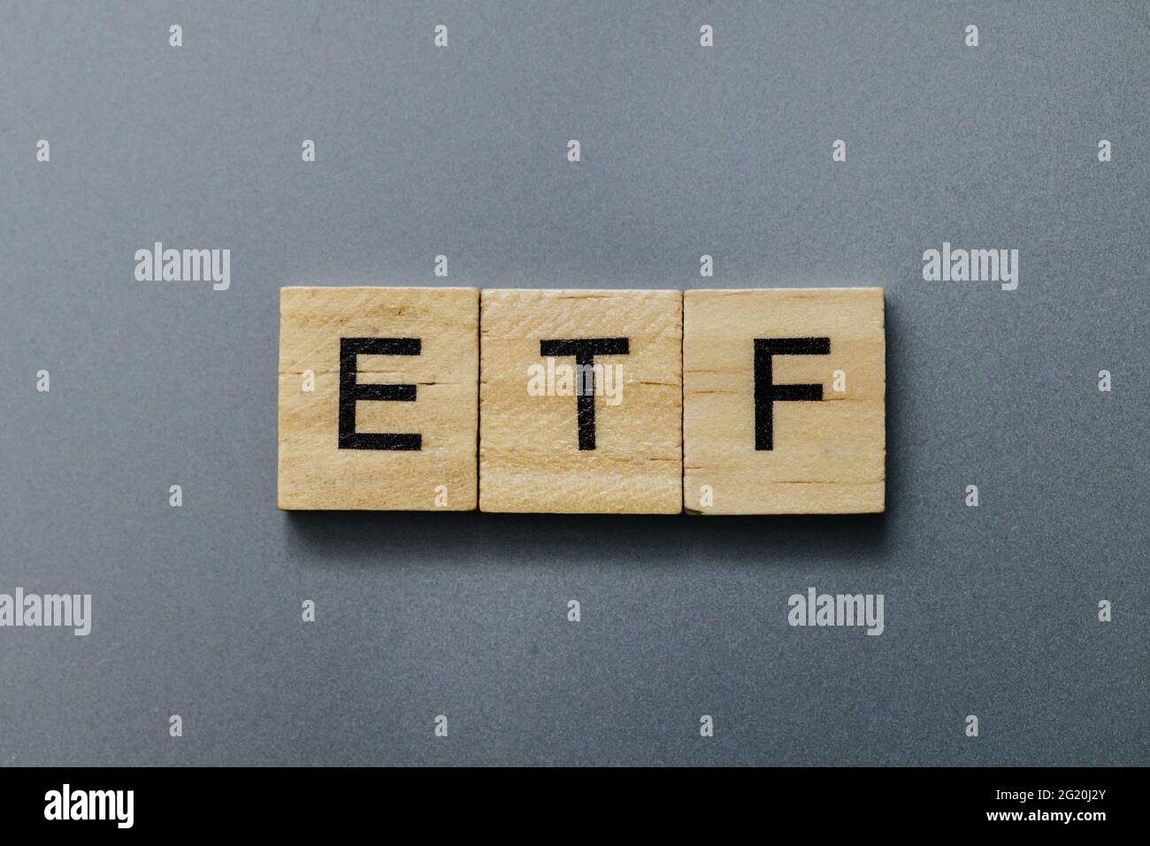 ETF Exchange-traded fund on wooden letters Stock Photo